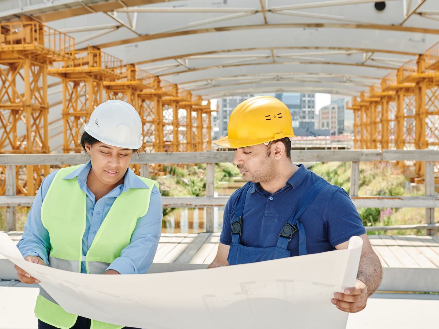 Structural engineers reviewing site conditions